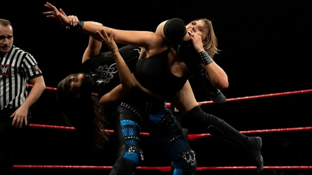 Rhea Ripley & Piper Niven def